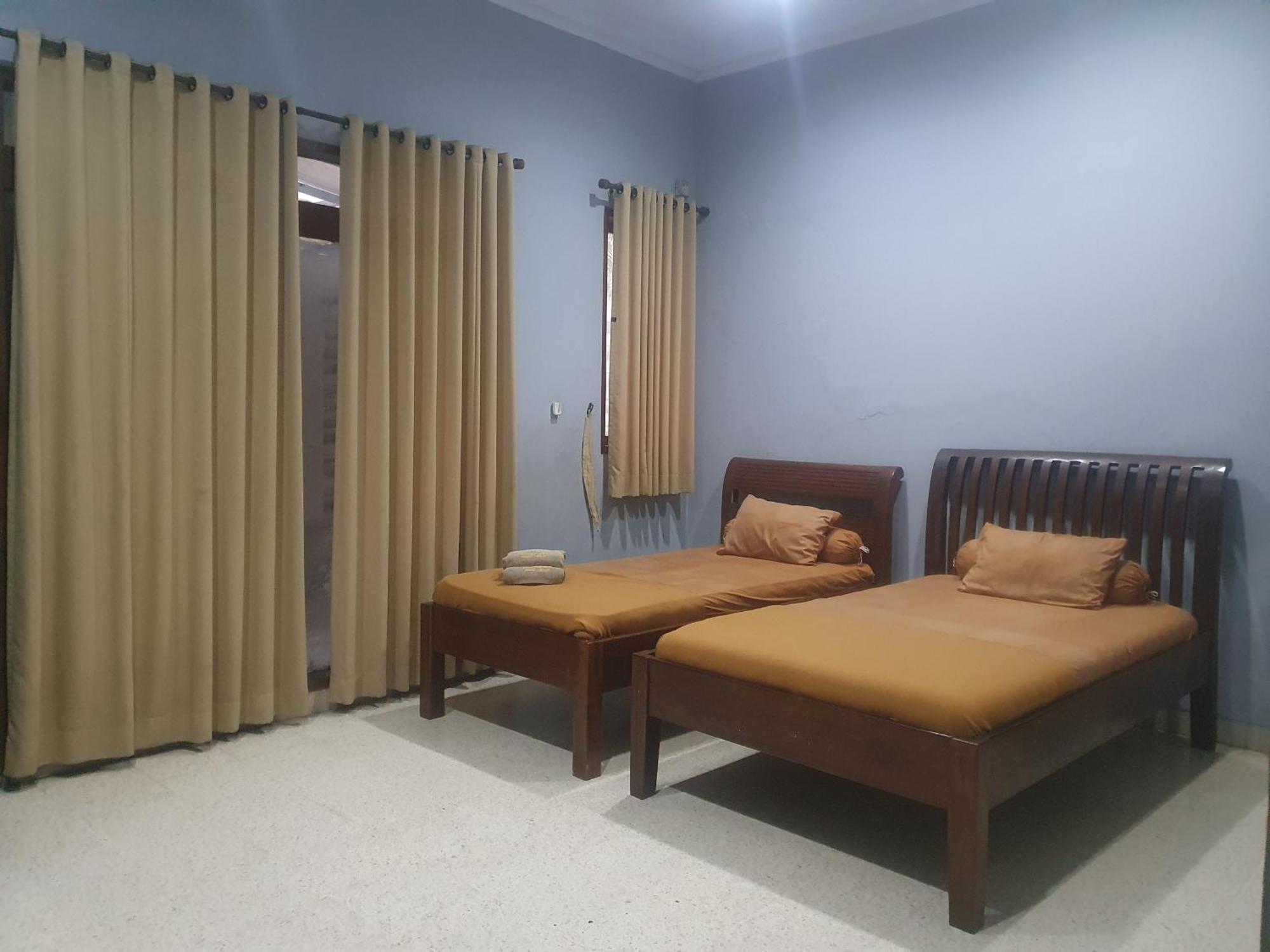 Ruang Tidur At Dpalma Bogor Hotel ภายนอก รูปภาพ